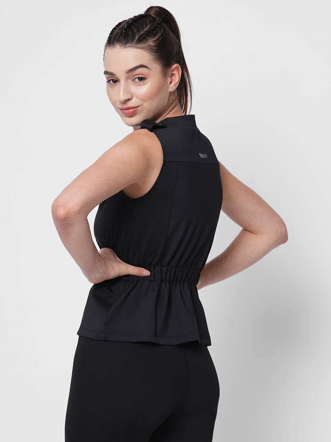 Black sporty sleeveless peplum jacket